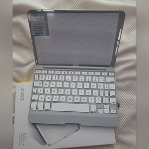 ZAGG Folio hinged keyboard folio for ipad mini. New In Box